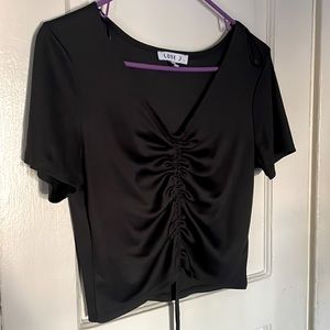 Black shirt with scrunched middle